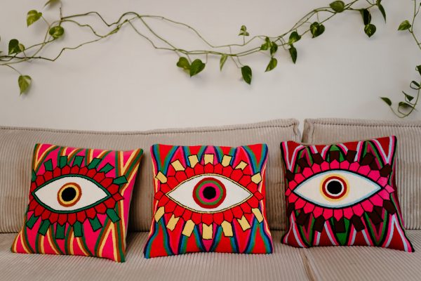 Housse de coussin motif oeil multicolore