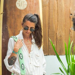 Bandoulière vert pastel avec un motif oeif